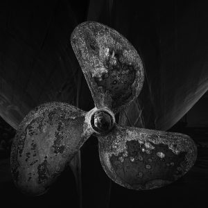 Rusty propeller on dismissed boat