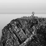 View of North Cape and people under Globe Monument.