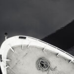 Bow of a fishing boat seen from above